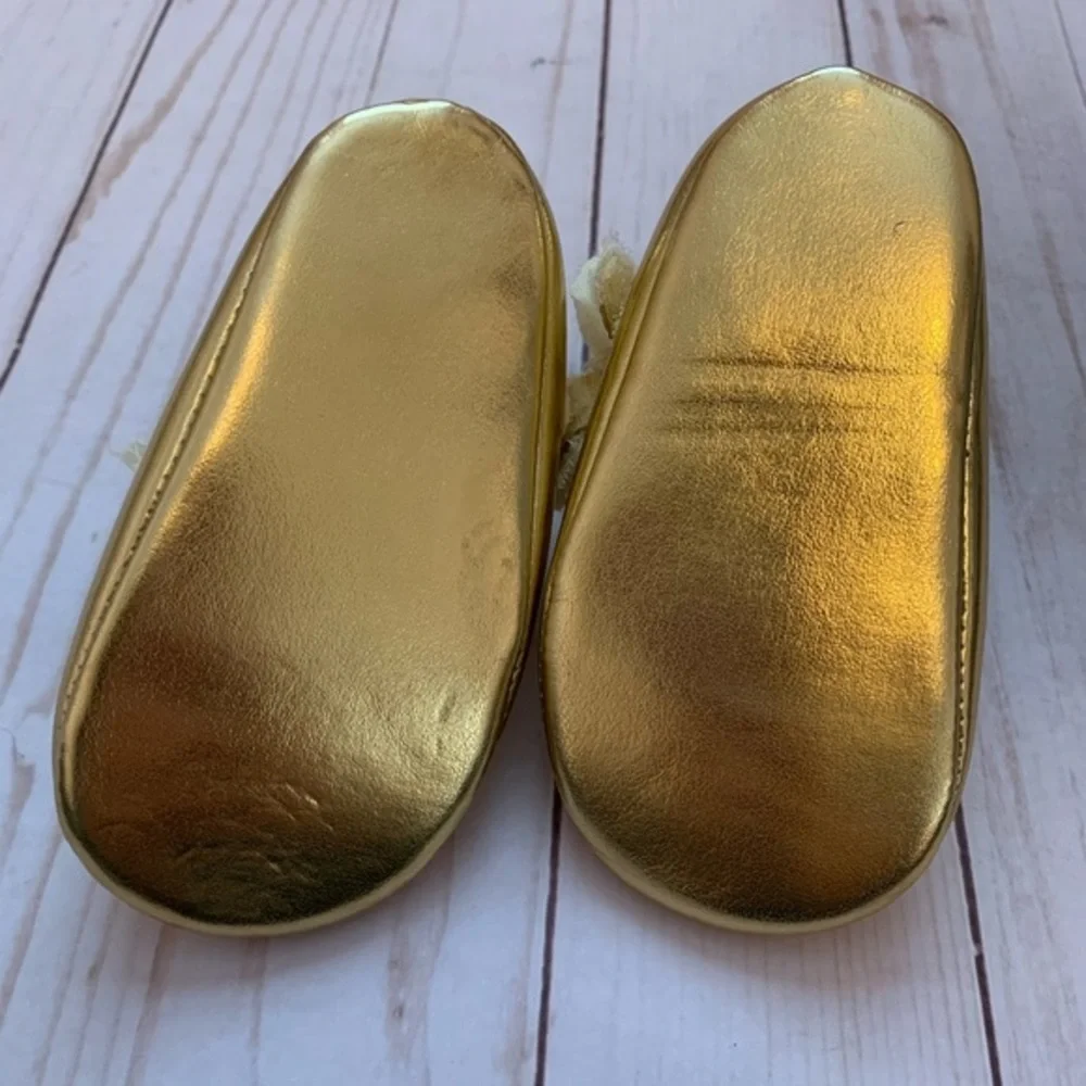 Baby girls gold Mary Janes 9-12m